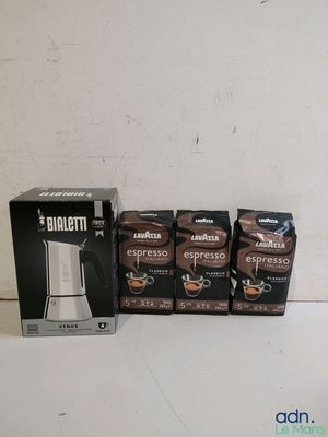 several boxes of coffee are lined up on a table