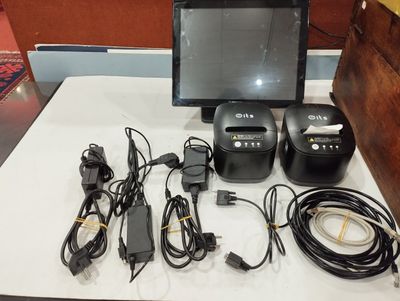 a picture of a desk with a monitor, printer, charger, and other electronics