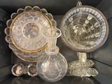 a lot of glass items sitting in a box