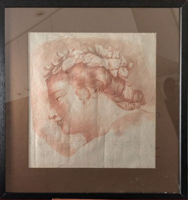 un dessin représentant la tête d'une femme de profil, avec une fleur dans les cheveux