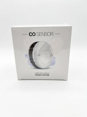 the box is open on a white surface with a black and white logo