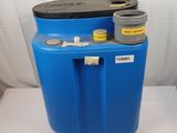 an image of a blue plastic barrel with a black lid and a yellow valve