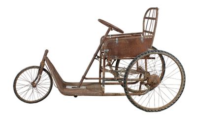 an old fashioned bicycle with a basket on the back of it