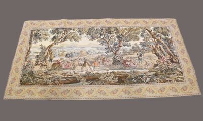 une grande tapisserie représentant un paysage et des personnages