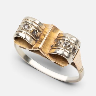 une image représentant une bague en or et en argent sertie de diamants