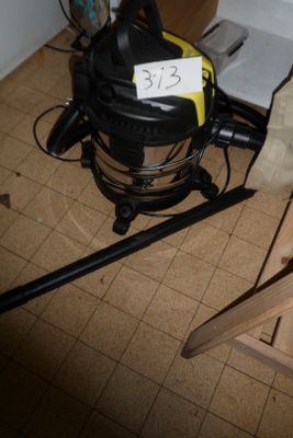 a picture of a chair that has a sign on the back of it