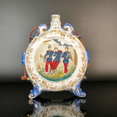 a picture of a vase with a picture of a man and a woman on it