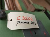 a label that says c3222 on a piece of wood
