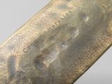 a close up of a knife that is on a table