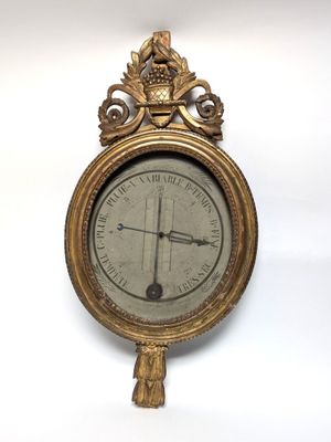 a clock that is hanging on the wall in the room