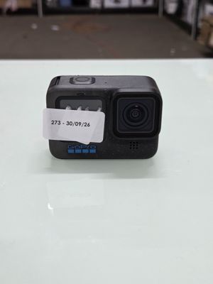 an action camera sitting on top of a table in a store