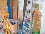 a pile of assorted items sitting in a garage