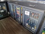 many bottles of alcohol in the fridges in the kitchen