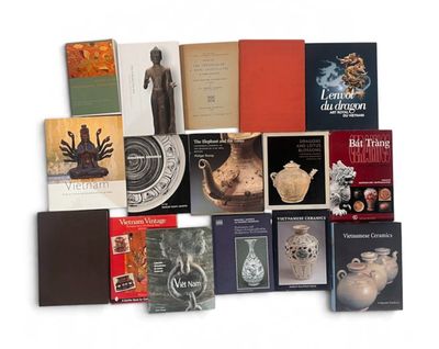 a lot of books that are sitting on a table