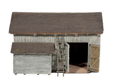 an image of a model of a barn with a door open