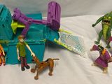 a lot of action figures that are on the table