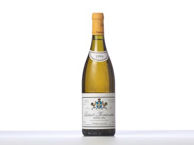 a bottle of wine that is sitting on a table
