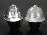 two helmets that are sitting on top of each other