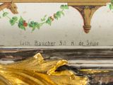 a picture of a gold clock with a horse on it
