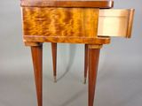 an image of a small wooden table with a drawer