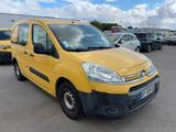 the yellow van is parked in a parking lot with other cars
