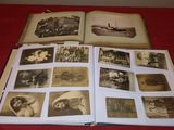 an open book with pictures of people on it sitting on a table