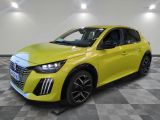 a bright yellow car is parked in a room with a checkered floor