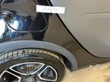 a close up of a car with a sticker on it
