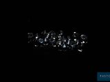 a close up of a bunch of diamonds on a black surface