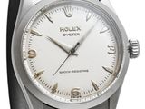 an image of a close up of a wrist watch on a white background