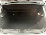 a trunk of a car with a luggage bag in it