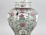 an image of a vase with a lid on a table