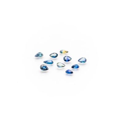 a group of blue sapphires on a white background