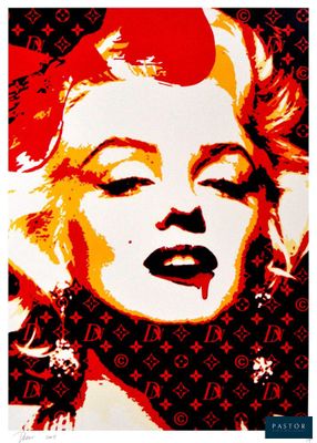 un tableau représentant Marilyn Monroe en rouge et noir