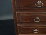 an image of a wooden dresser with four drawers