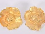 pair of gold plated flower brooches