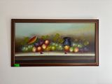 une photo d'un tableau représentant des fruits accroché au mur