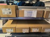 many boxes that are stacked on top of each other