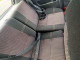 a seat belt in the back of a car