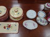 a table with a lot of plates and bowls on it