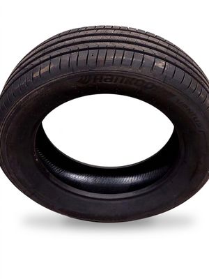 a close up of a tire on a white background