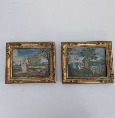 deux tableaux encadrés représentant une femme et un homme dans un paysage