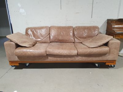 a couch that is sitting in the middle of a room