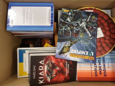 a box full of books that are sitting on a table