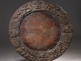 an image of a wooden plate with a design on it