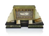 a clock that is sitting on top of a table