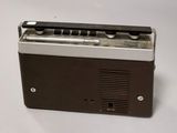 a radio that is sitting on a white table