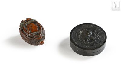 an image of a small ring and a small ring on a white surface