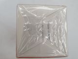 someone is holding a plastic box with a clear lid