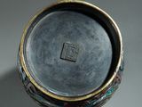 chinese silver and gold vase with floral decoration on the rim